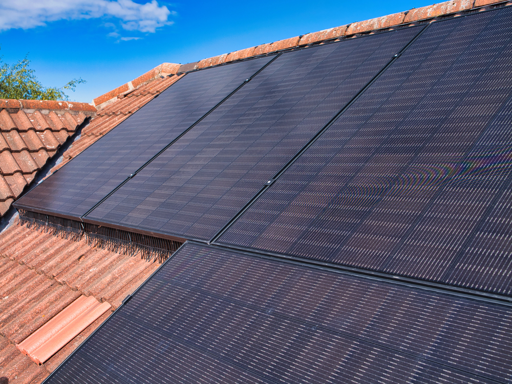 Solar panels installed on a pitched domestic roof