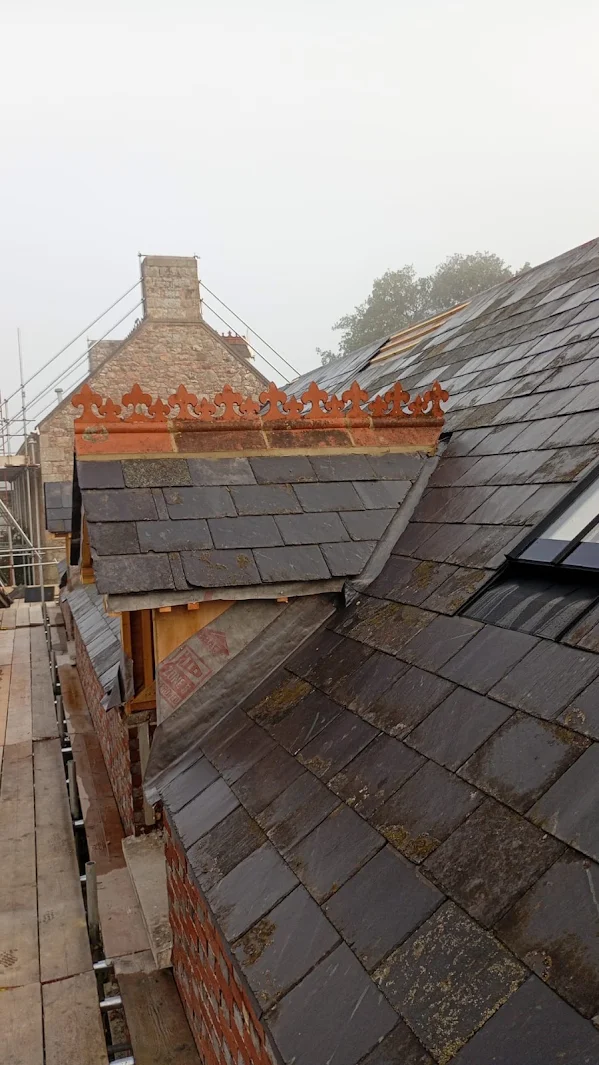 Tiled roof with original ridge cresting retained